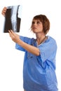 Young female doctor examining x-ray Royalty Free Stock Photo