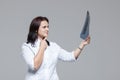 Young female doctor examining the x-ray picture of lungs