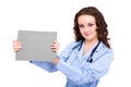 Young female doctor holding a blank Royalty Free Stock Photo