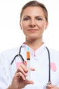 Young female doctor holding a syringe Royalty Free Stock Photo