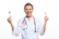 Young female doctor holding a syringe Royalty Free Stock Photo