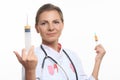 Young female doctor holding a syringe Royalty Free Stock Photo