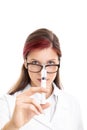 Young female doctor holding a syringe and needle Royalty Free Stock Photo