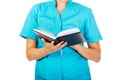 Young female doctor or nurse holding black notes Royalty Free Stock Photo