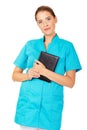 Young female doctor or nurse holding black notes Royalty Free Stock Photo