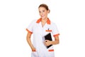 Young female doctor or nurse holding black notes Royalty Free Stock Photo