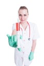 Young female doctor or nurse showing syringe in close-up Royalty Free Stock Photo