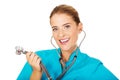 Young female doctor or nurse with stethocope Royalty Free Stock Photo