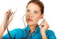 Young female doctor or nurse with stethocope Royalty Free Stock Photo