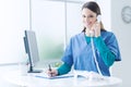 Female doctor at the reception desk Royalty Free Stock Photo