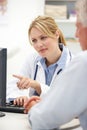 Young female doctor with senior patient Royalty Free Stock Photo