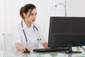 Young Female Doctor Working On Computer Royalty Free Stock Photo