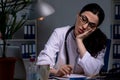 The young female doctor working at night shift Royalty Free Stock Photo