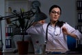 The young female doctor working at night shift Royalty Free Stock Photo