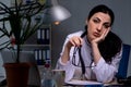 The young female doctor working at night shift Royalty Free Stock Photo
