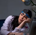 Young female doctor working at night shift Royalty Free Stock Photo