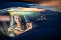 Young female driver driving her car at night Royalty Free Stock Photo