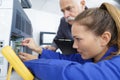 young female electrician at work Royalty Free Stock Photo