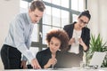 Young female employee asking for advice her experienced colleagu Royalty Free Stock Photo