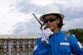 Young female engineer communicating. Royalty Free Stock Photo