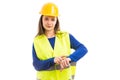 Young female engineer making late time gesture Royalty Free Stock Photo