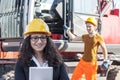 Young female engineer posing in junkyard Royalty Free Stock Photo