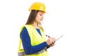 Young female engineer writing on clipboard Royalty Free Stock Photo