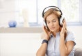 Young female enjoying music eyes closed Royalty Free Stock Photo