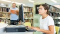 Young female European student studying with a computer Royalty Free Stock Photo