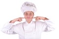 Young female executive chef point her cheek