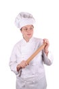 Young female executive chef with a rolling pin
