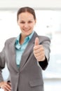 Young female executive doing a thumbs up Royalty Free Stock Photo