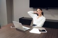 Young female executive smiling during meeting in office conference room Royalty Free Stock Photo