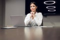 Young female executive smiling during meeting in office conference room Royalty Free Stock Photo