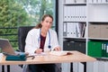 Young female family doctor in her office Royalty Free Stock Photo