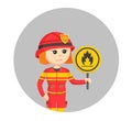 Young female firefighter holding a fire sign Royalty Free Stock Photo