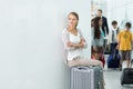 Young, female frustrated passenger at the airport Royalty Free Stock Photo