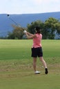 Young female golfer Royalty Free Stock Photo