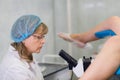 Young Female Gynecologist During Examination In Her Office