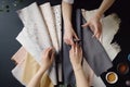 Young female hands with fabric samples for curtains , concept of Interior Design, created with Generative AI technology
