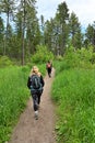 Young female hikers on Lion Mountain Trail near Whitefish, Montana.