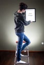 Young female holding picture frame Royalty Free Stock Photo