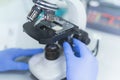 Young female Laboratory scientist working at lab with test tubes and microscope, test or research in clinical laboratory.Science, Royalty Free Stock Photo