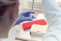 Young female Laboratory scientist working at lab with test tubes and microscope, test or research in clinical laboratory.Science, Royalty Free Stock Photo