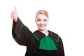 Young female lawyer attorney wearing classic polish black green gown