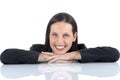 Young female lawyer legal professional relaxing with smile, arms folded on desk