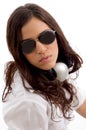 Young female listening music on headset Royalty Free Stock Photo