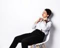 Young female managing director sitting in white shirt looking at the corner. Woman lawyer with thinking Royalty Free Stock Photo