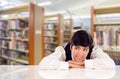 Young Mixed Race Student Daydreaming In Library Looking Up Royalty Free Stock Photo