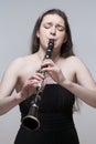 Young Female Musician Playing Clarinet